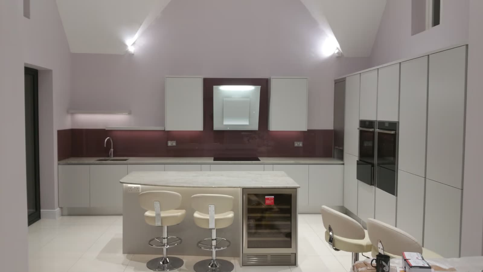 Modern Gloss Kitchen Renovation with Glass Splashback — image 1