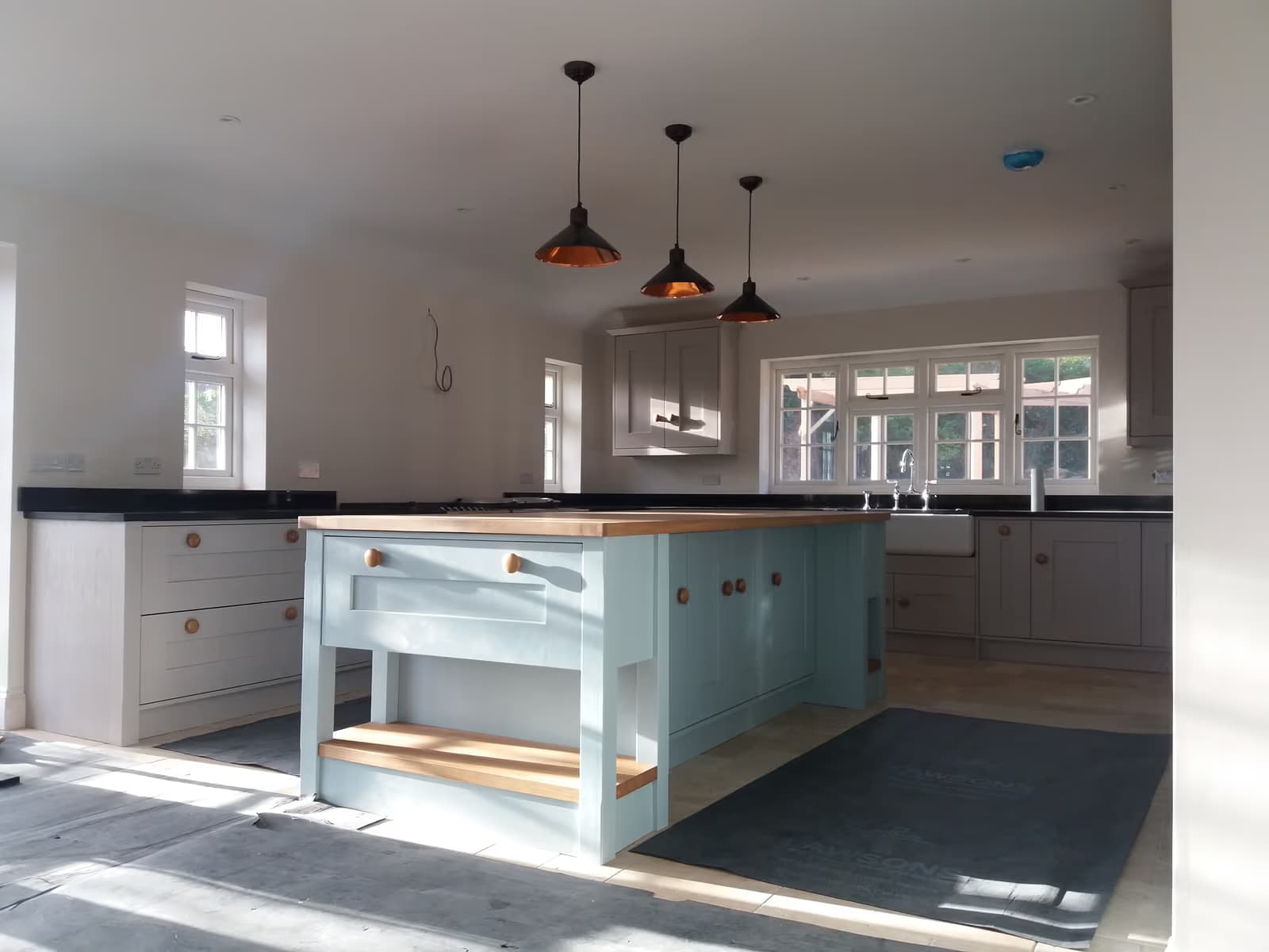 Shaker Kitchen Renovation with Copper Pendants — image 4
