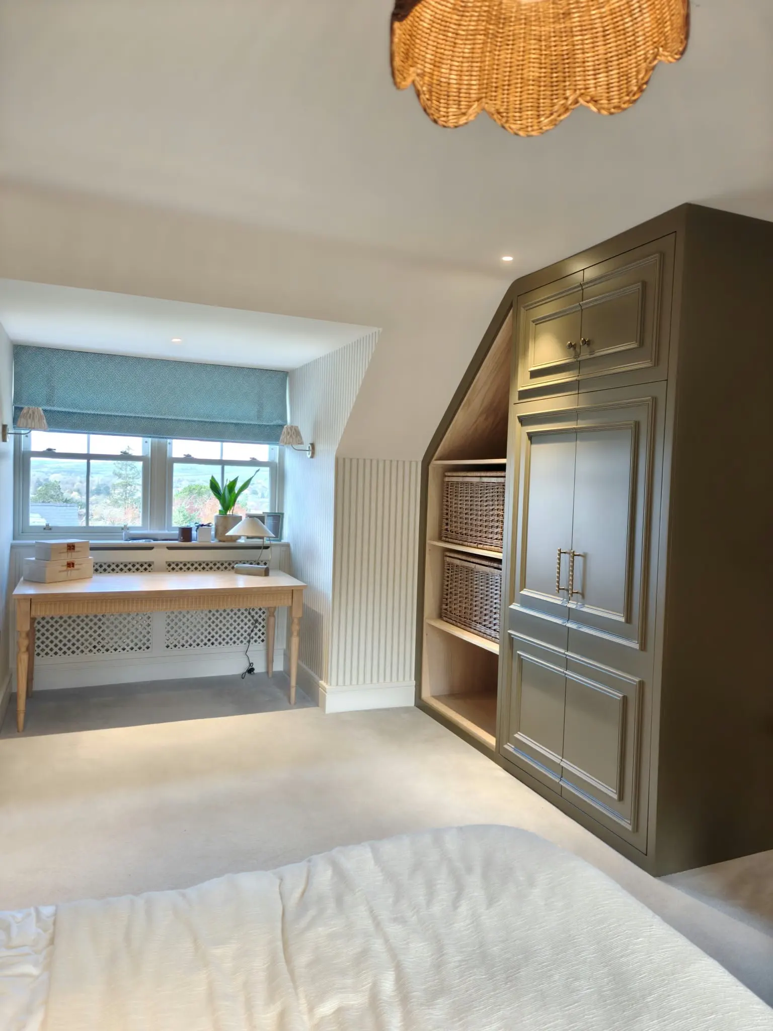 Wardrobe shaped to a sloping loft ceiling